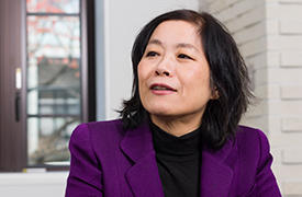 Director of AIMR, Motoko Kotani, likens the international cooperation between researchers as being like musicians playing together in an ensemble.