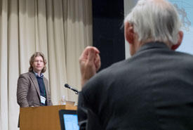 Professor at the University of Wisconsin−Madison, John Perepezko (right; AIMR adjunct professor) posing a question to Chris Pickard, professor of the University of Cambridge, UK (AIMR principal investigator), at the Q&A session of the AIMR Workshop 2018.