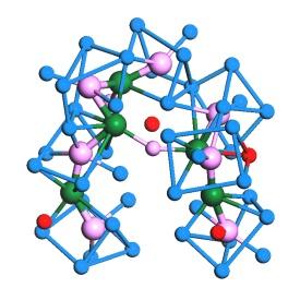 バルク金属ガラスであるパラジウム-ニッケル-リンの原子構造。リン（ピンク）、ニッケル（緑）、規則的に配列したパラジウム（青）、規則性のないパラジウム（赤）から構成される。
