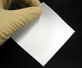 A flexible, thermally conductive film containing boron nitride nanocrystals