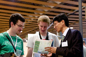 Researchers from around the world visited the WPI booth to find out how they could collaborate with interdisciplinary research centers in Japan like the AIMR.